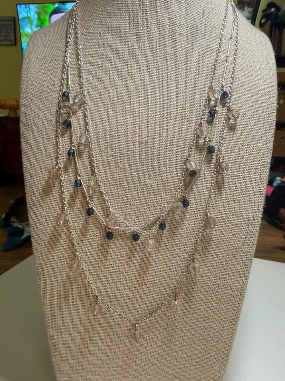 Silver tone multi strand beaded necklace